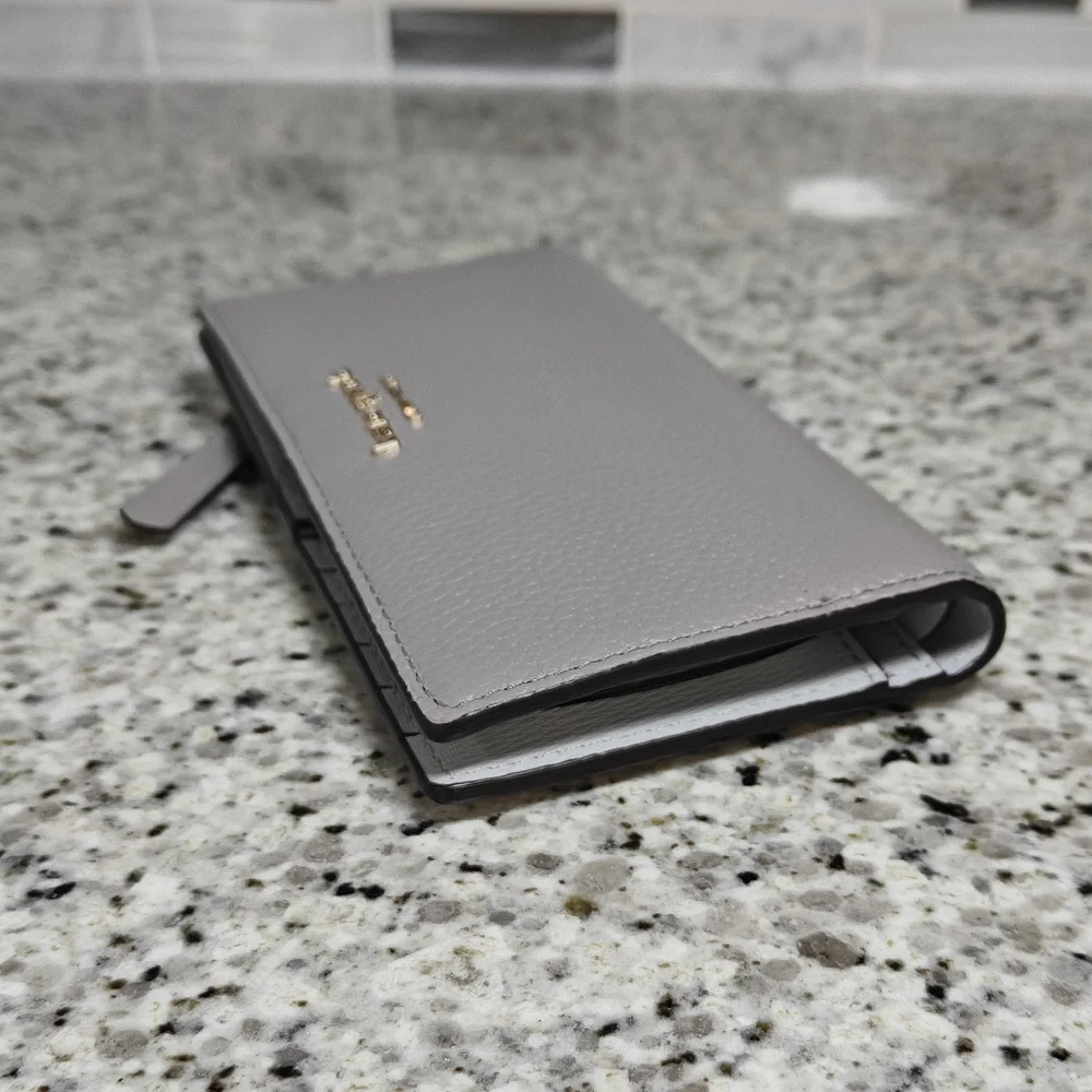 Kate spade roulette wallet (gray)